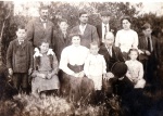 Bean's Paternal Great-Great-Grandparents Isabella (Edwards) Brown and Alexander A. Brown (seated adults) and Great-Grandfather Percival A. Brown standing in the back row to the far right.