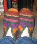 My new slippers (I swear the stripes were even before felting!)
