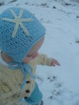 Lilly wearing her snowflake hat