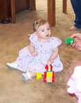Maddy playing with blocks
