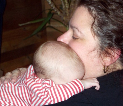 Annabel snuggled up with Grandma Joan