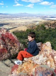 Nathan perched on a rock outside of Virginia City, NV