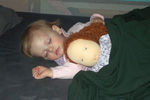 Annabel taking a nap with her new baby doll