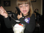 Talking to Great-Grandpa & Grams while eating her sundae
