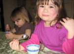 Annabel intent on ice cream, Leann preparing herself for the camera :)