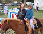 Annabel's first pony ride @ the Kids Fair