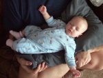 Annabel sleeping on Daddy's lap