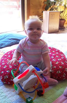 Annabel sitting up & playing (#2)