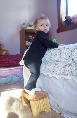 climbing up on the bed