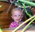 Hiding behind the jungle plant