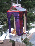 Our finished bird feeder hanging out front