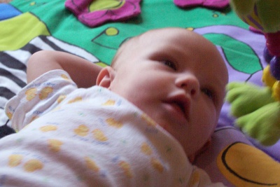 Annabel on the playmat with perfect lighting