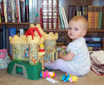 Annabel playing with the castle she inherited from Momma