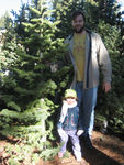 Posing with Daddy and our tree