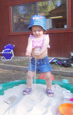 Playing in the sandbox (and wearing a new bikini top from Aunt Laura)