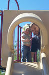 With Daddy at the top of the slide