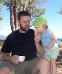 Sharing sherbet on the beach with Daddy