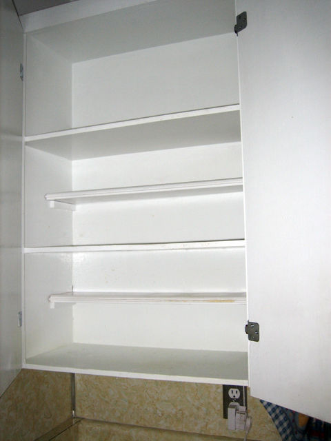 half-shelves inside kitchen cupboards