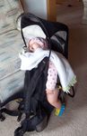 Alli asleep in her snugli backpack