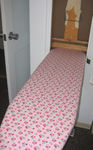 new custom-fitted ironing board cover!