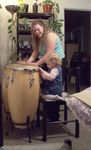 Playing bongos with Aunt Jula