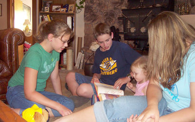 Reading a book with my cousins