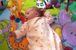 Annabel on her playmat