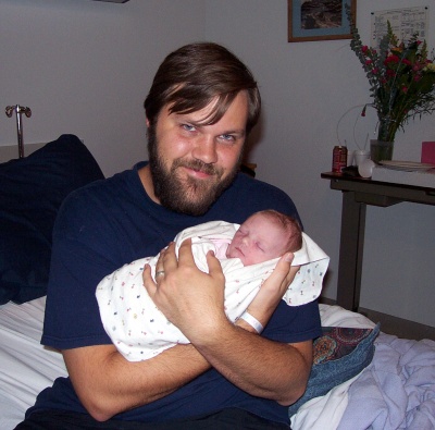Daddy and Annabel one day old